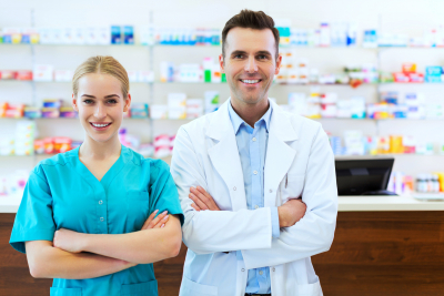 two pharmacists smiling